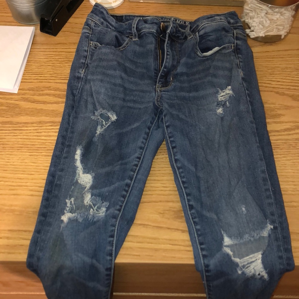 AE HIGH WAISTED SKINNY RIPPED JEANS